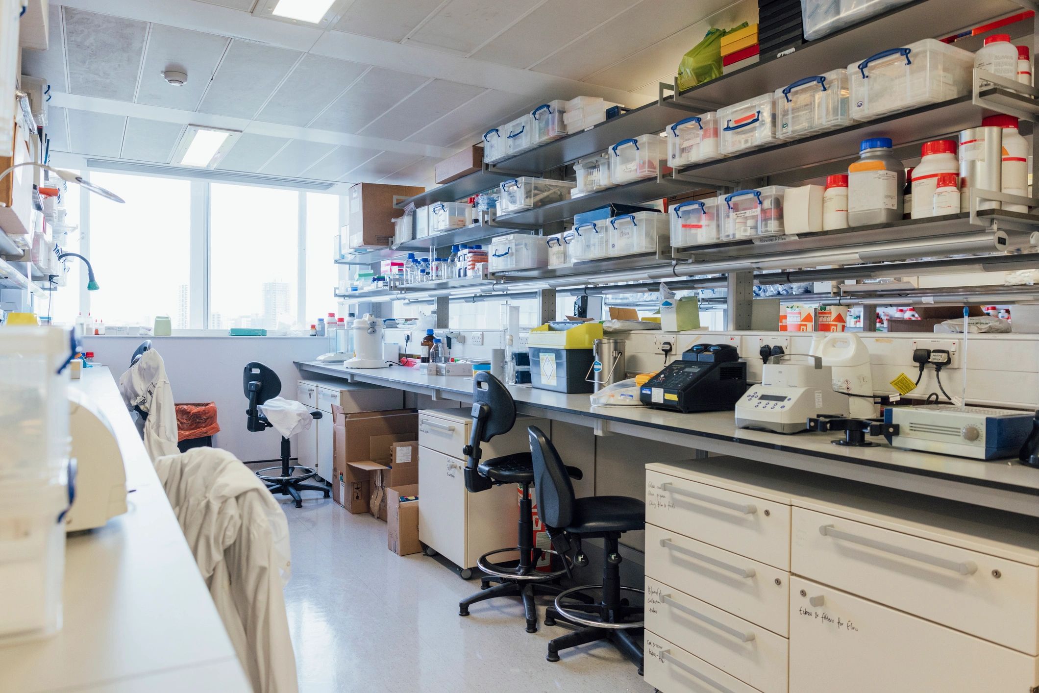 Bright modern laboratory workspace with benches and equipment