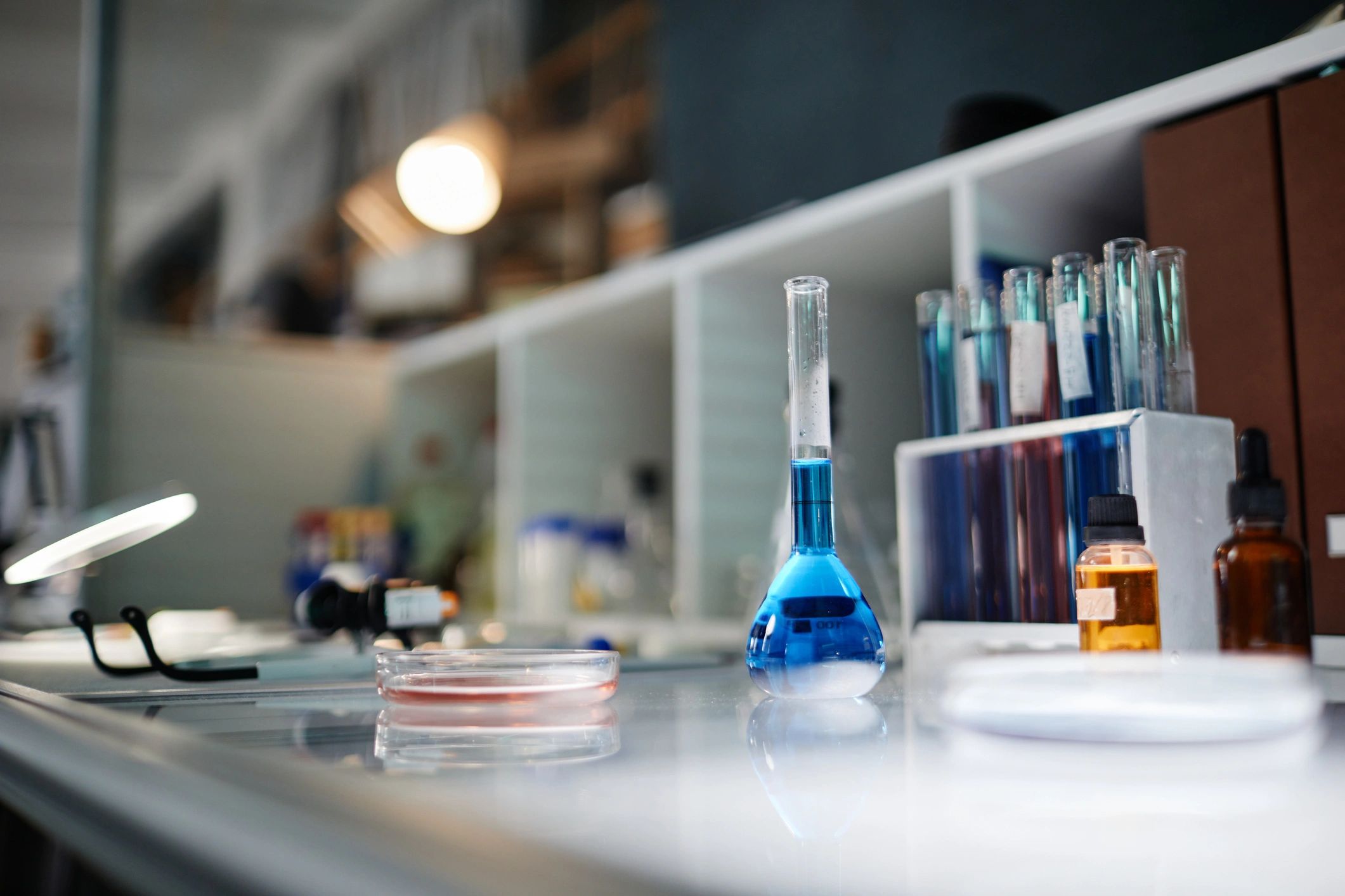 Laboratory glassware on a clean bench representing research materials and documentation